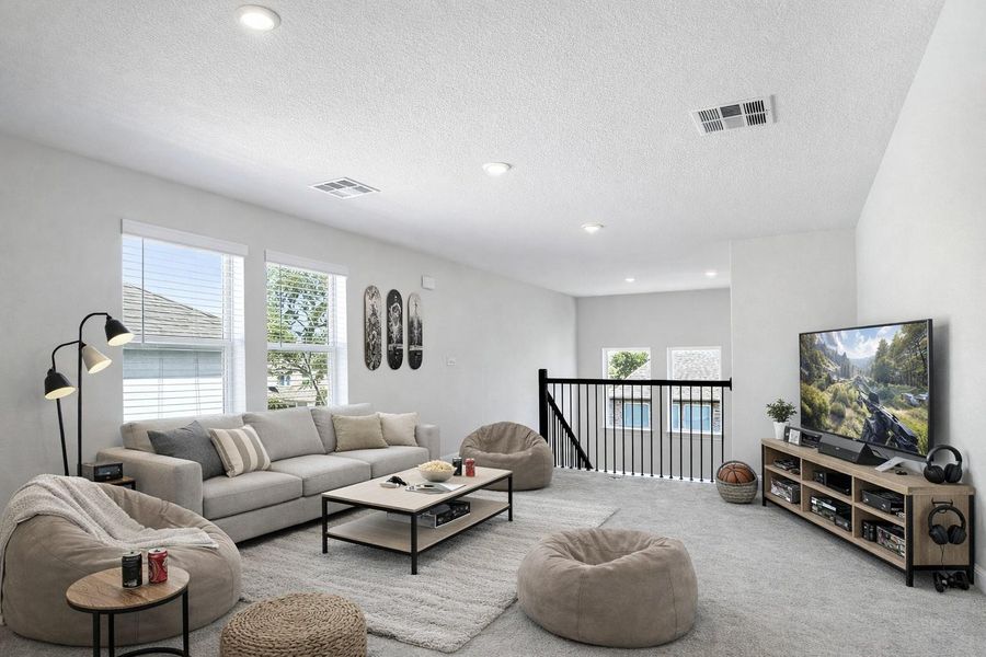 Loft game room or flex space - virtually staged