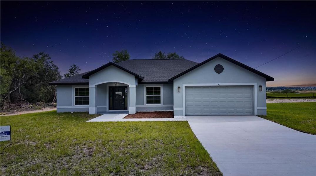 Front exterior of a new home in , Ocala, FL, highlighting curb appeal (Image 18).