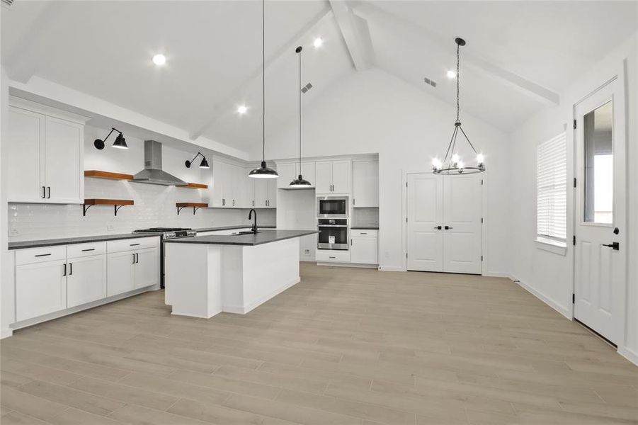 View of kitchen and dining area from great room