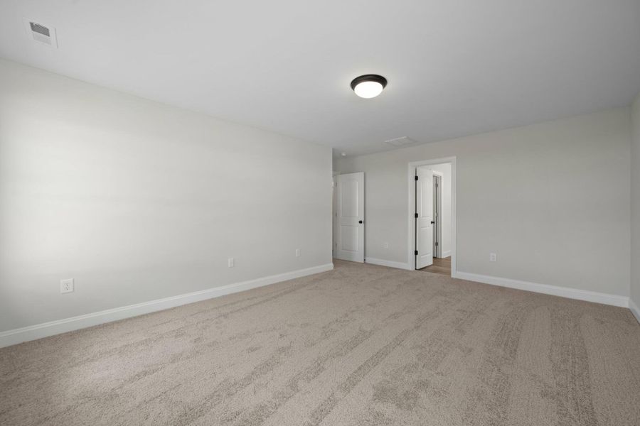 Spacious, unfurnished interior of a new home in Cottages at Piper Village, Trinity (Image 33).