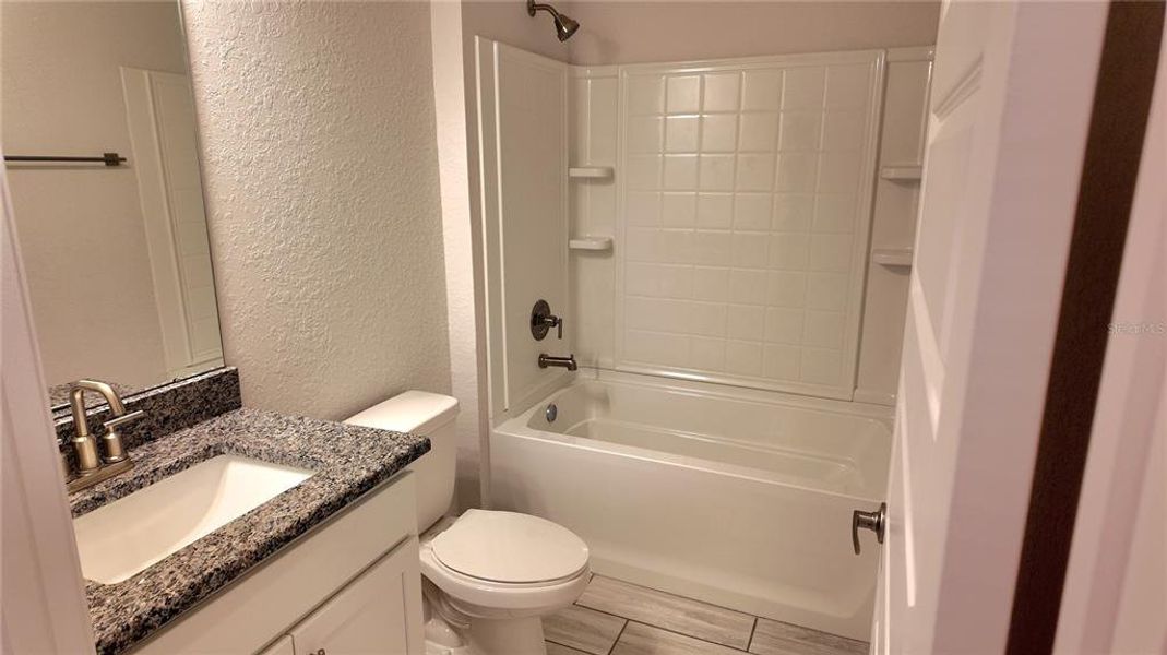 Furnished interior view inside a new home in Pine Bluff, Spring Hill (Image 5).