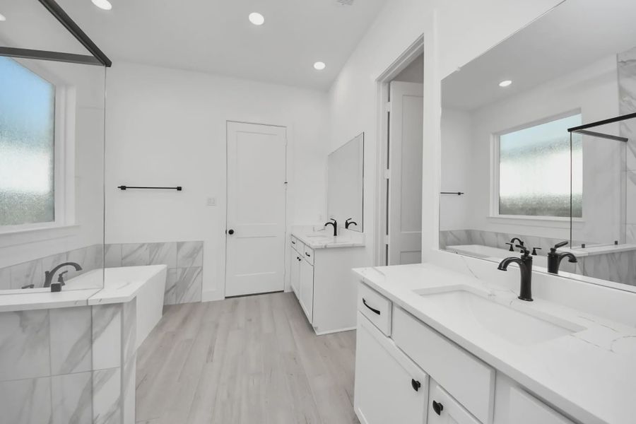 Representative furnished interior of a home built from the Summerton by Chesmar Homes in Meridiana 50's and 60's, Manvel (Image 39).