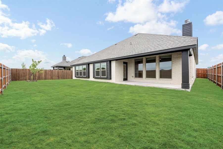 Front exterior of a new home in The Retreat at North Grove 60, Waxahachie, TX, highlighting curb appeal (Image 2). Front exterior of a new home in The Retreat at North Grove 60, Waxahachie, TX, highlighting curb appeal (Image 2).