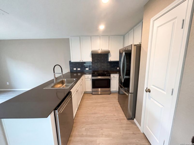 Furnished interior view inside a new home in Aston Park, San Antonio (Image 9).