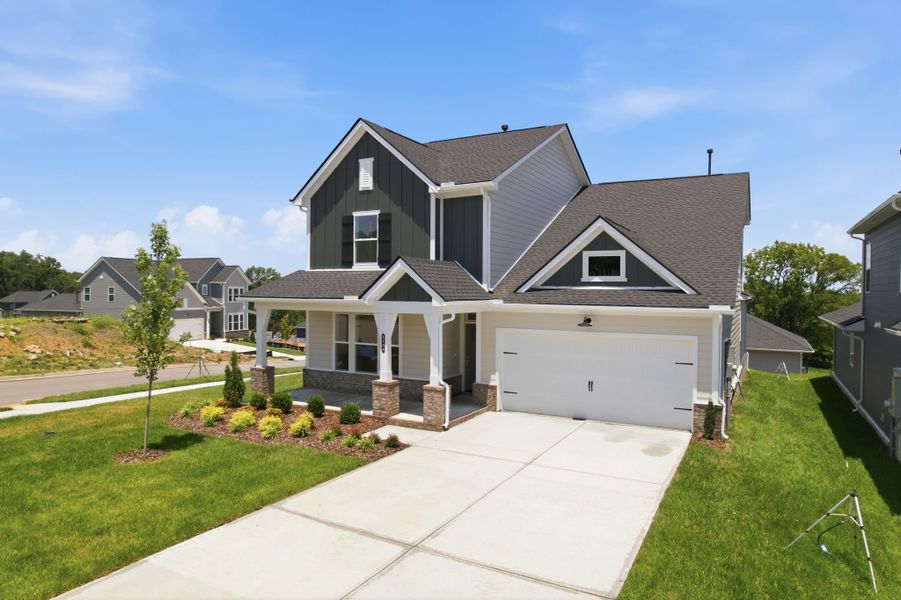 Front exterior of a new home in The Preserve at Five Oaks, Lebanon, TN, highlighting curb appeal (Image 23).