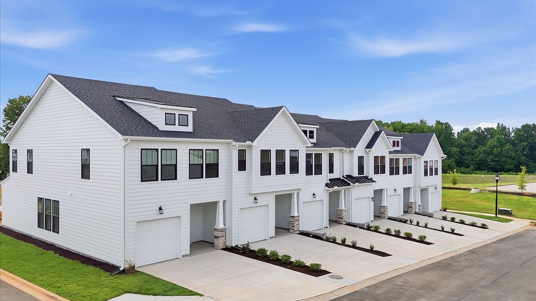Front exterior of a new home in Gresham Station, Simpsonville, SC, highlighting curb appeal (Image 23).
