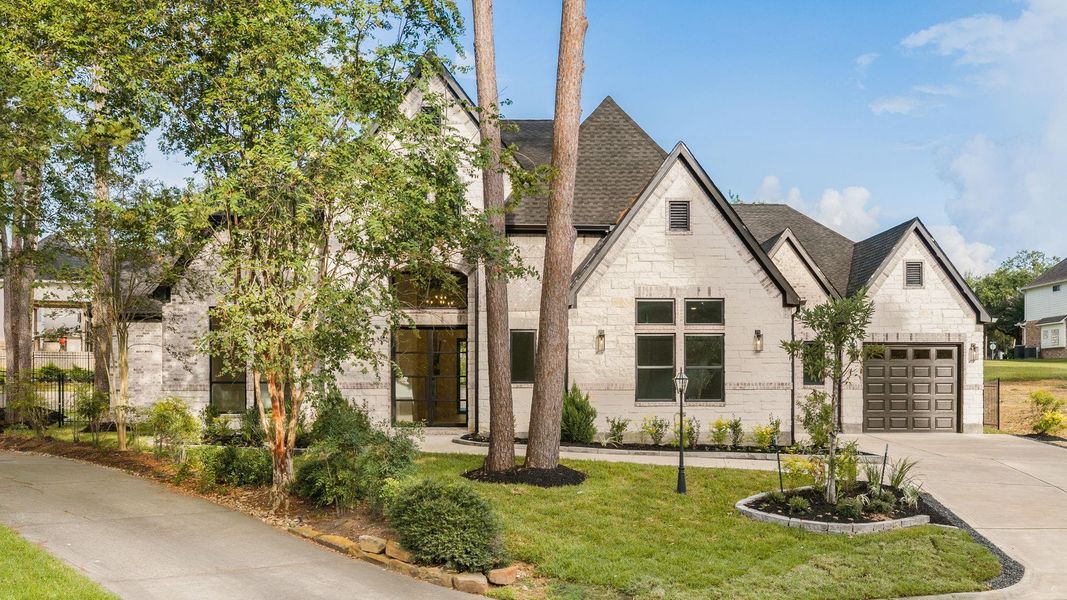 Front exterior of a new home in , Montgomery, TX, highlighting curb appeal (Image 22).