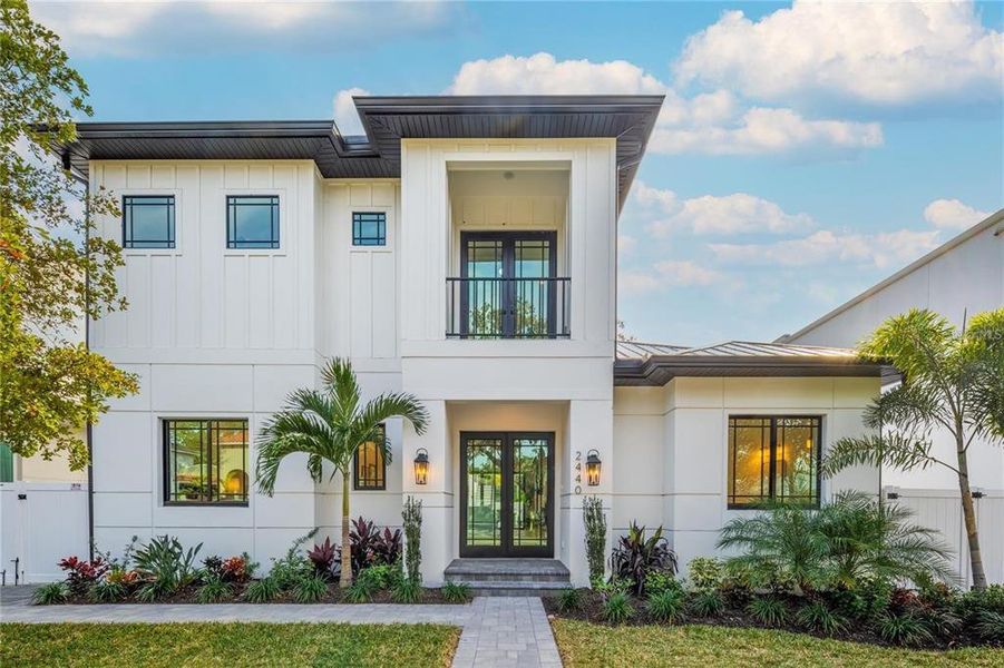 Front exterior of a new home in , Sarasota, FL, highlighting curb appeal (Image 1).