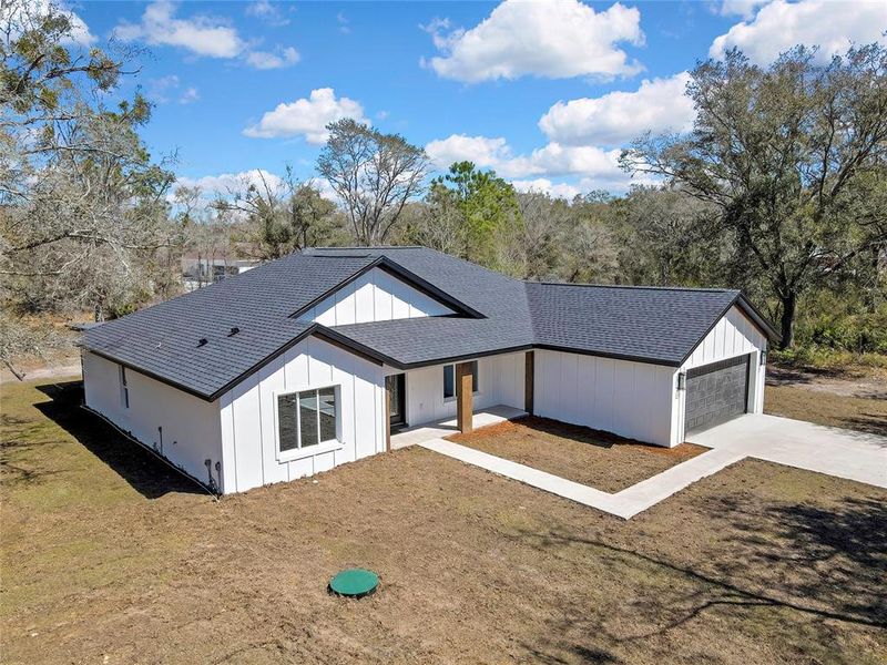 Front exterior of a new home in , Crystal River, FL, highlighting curb appeal (Image 27).