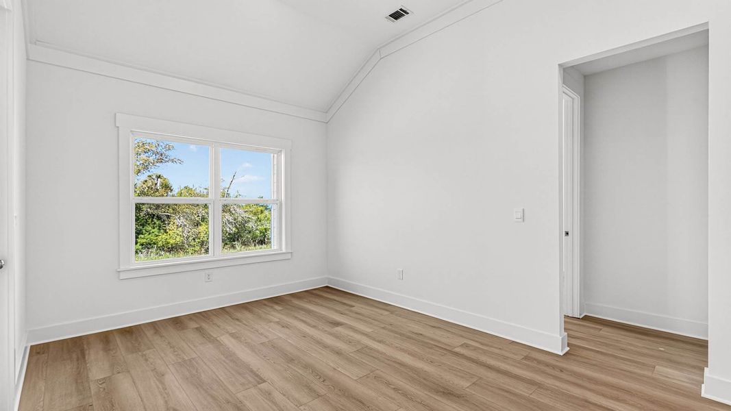 Representative unfurnished interior of a home built from the The Lily by D.R. Horton in WindMark Beach, Port Saint Joe (Image 23).