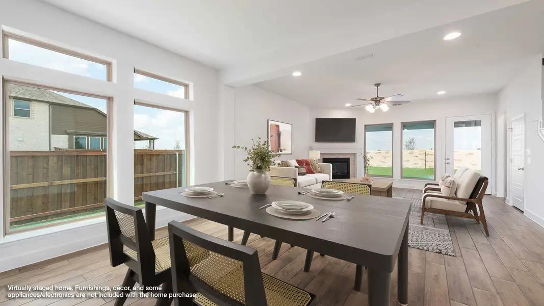 Representative furnished interior of a home built from the 2444W by Perry Homes in Lariat 45', Liberty Hill (Image 6).