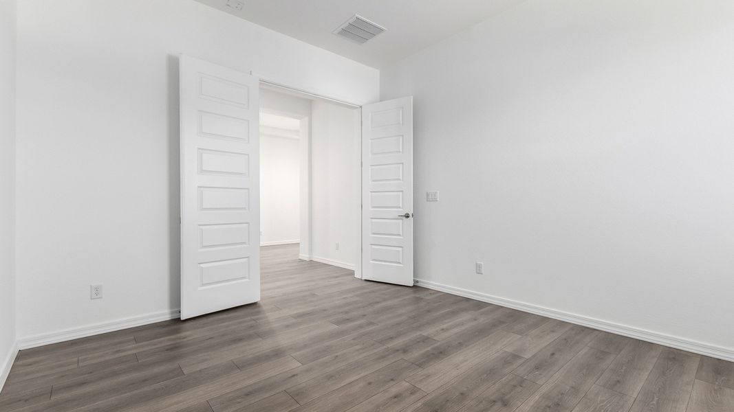 Representative furnished interior of a home built from the Granada by DRB Homes in Windrose, Waddell (Image 35).