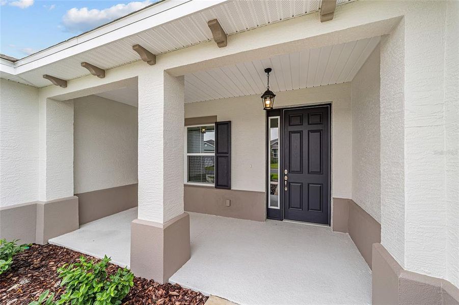 Exterior details and patio area of a home in On Top of the World Communities, Ocala (Image 28).