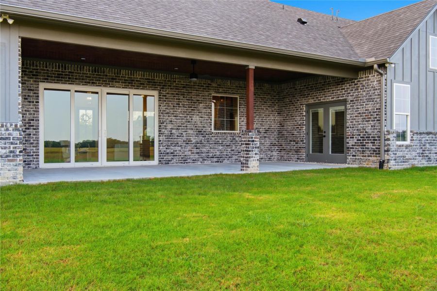 Exterior details and patio area of a home in , College Station (Image 19). Exterior details and patio area of a home in , College Station (Image 19).