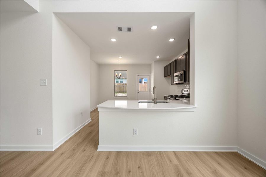 Furnished interior view inside a new home in Lexington Heights, Willis (Image 6).