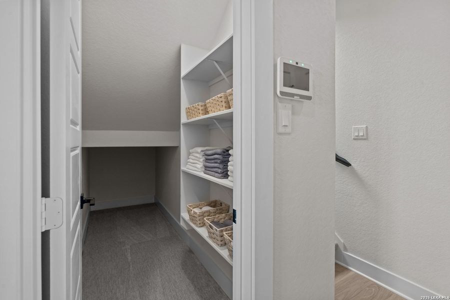 Furnished interior view inside a new home in Prominence, San Antonio (Image 29).