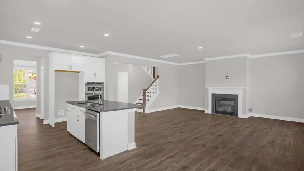 Furnished interior view inside a new home in The Estates Park, Apex (Image 9).