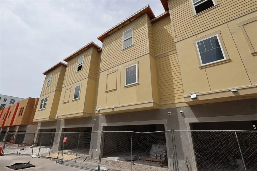 In-progress construction of a new home in Towns at Union, St. Petersburg, FL (Image 15).