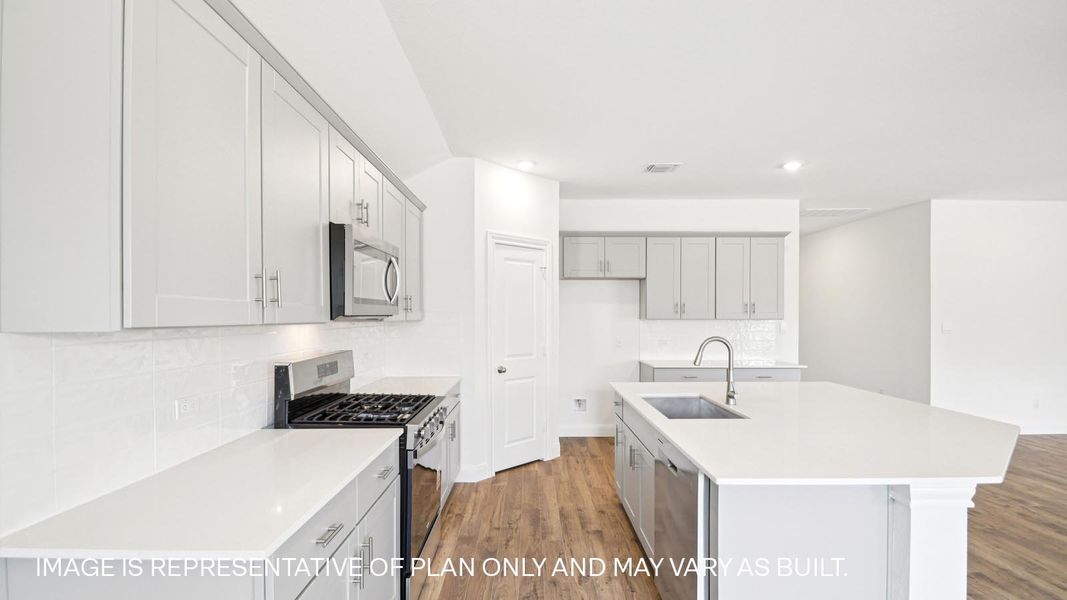 Representative furnished interior of a home built from the The Hudson by D.R. Horton in Railhead, Cedar Creek (Image 5).