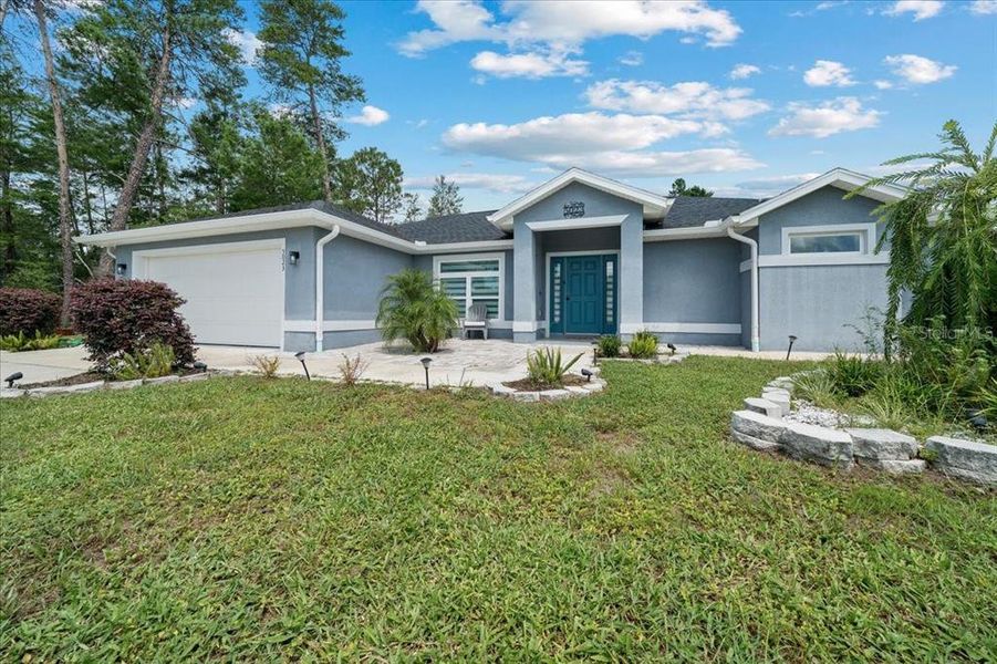 Front exterior of a new home in , Ocala, FL, highlighting curb appeal (Image 22). Front exterior of a new home in , Ocala, FL, highlighting curb appeal (Image 22).