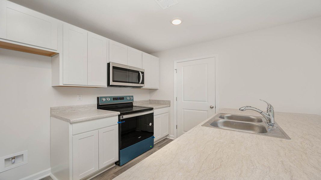Representative furnished interior of a home built from the WYETH by D.R. Horton in Cottonwood Place, Tabor City (Image 4).