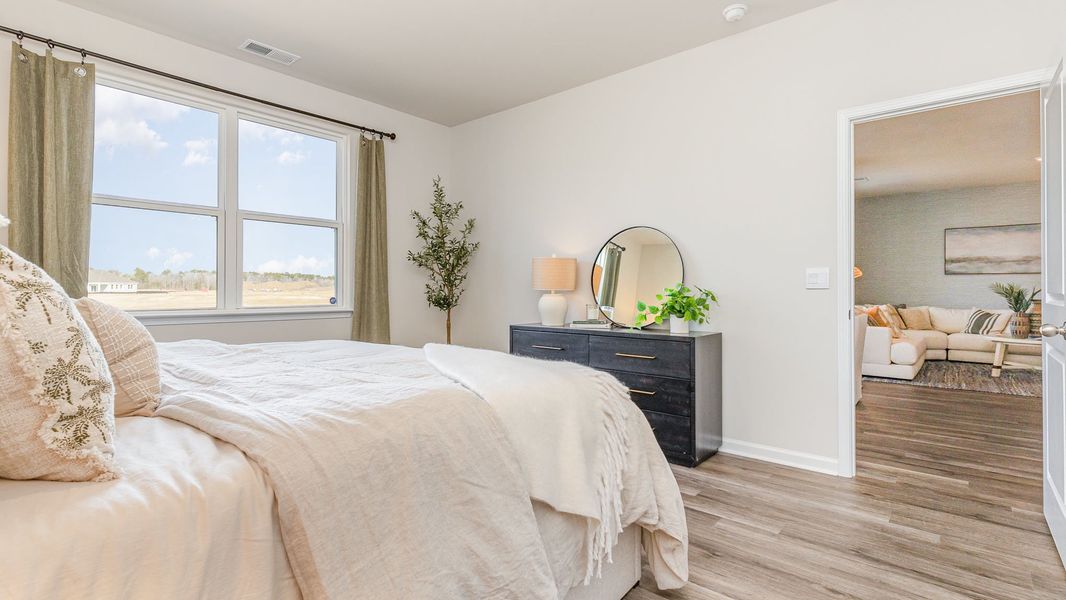 Furnished interior view inside a new home in Stanbury Creek, Supply (Image 9).