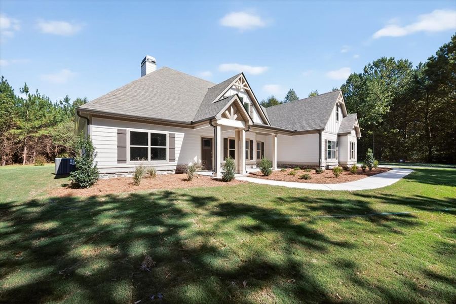 Exterior details and patio area of a home in White Oaks, The Rock (Image 23).