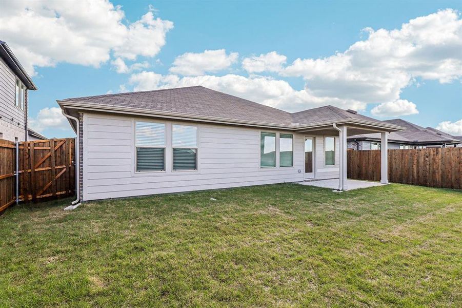 Exterior details and patio area of a home in River Ridge, Crandall (Image 3).