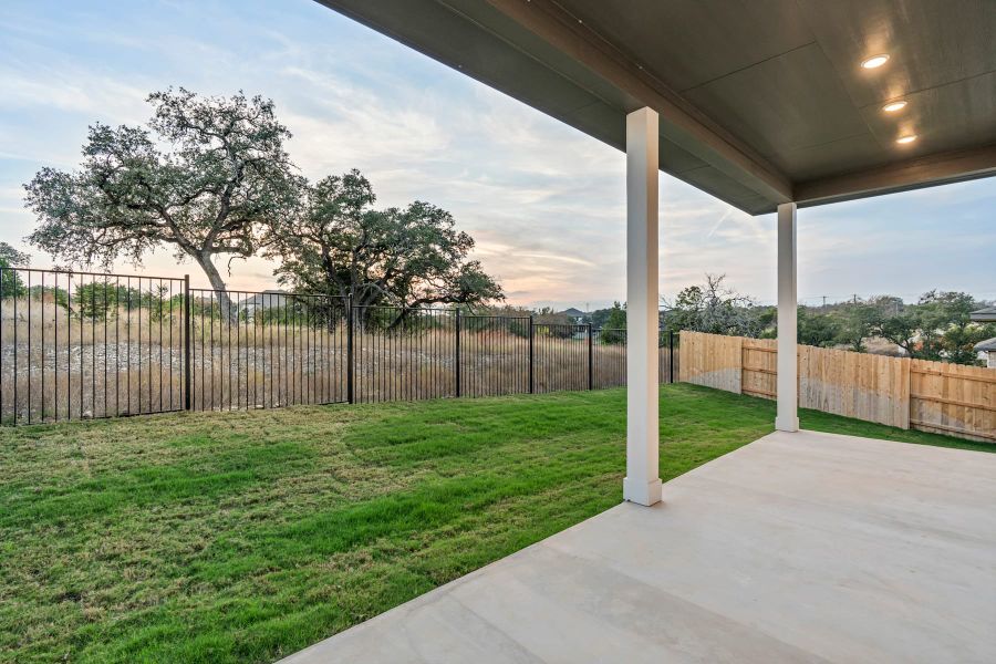 Exterior details and patio area of a home in Lariat, Liberty Hill (Image 4).