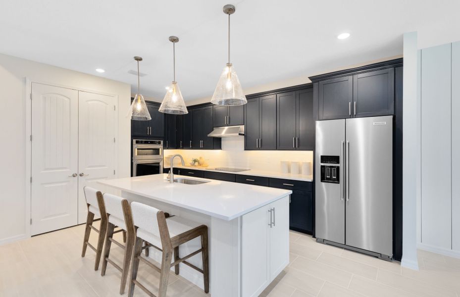 Representative furnished interior of a home built from the Symphony by Pulte Homes in EverBe, Orlando (Image 17).