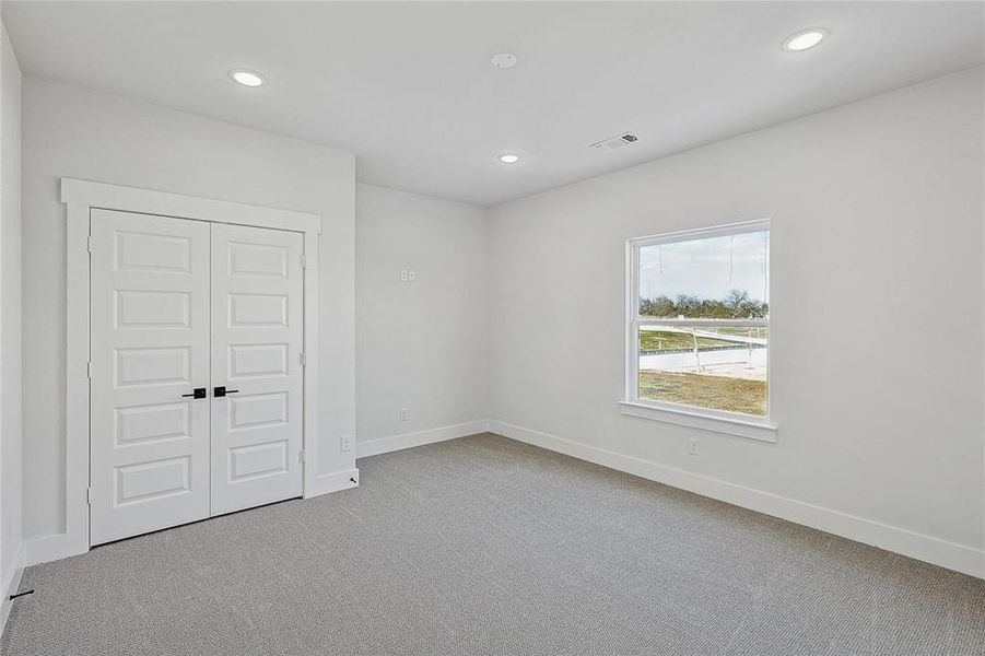 Upstairs Bedroom #4 with walk-in closet.