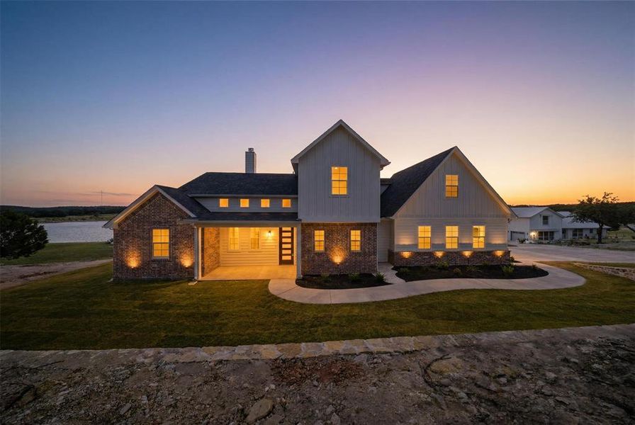 Front exterior of a new home in , Bluff Dale, TX, highlighting curb appeal (Image 1). Front exterior of a new home in , Bluff Dale, TX, highlighting curb appeal (Image 1).