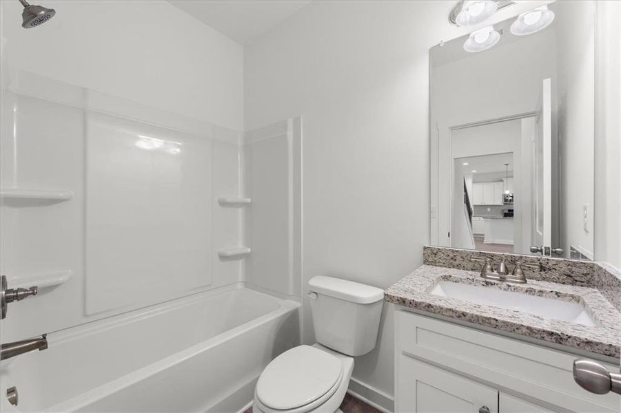 Furnished interior view inside a new home in Ellington Farms, Statham (Image 9).