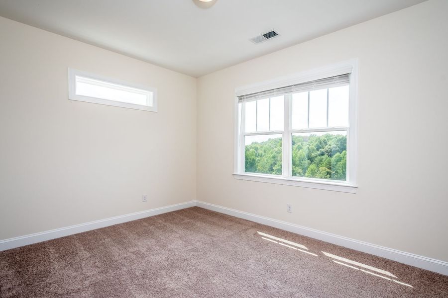 Representative unfurnished interior of a home built from the Harvard by Greybrook Homes in Harbor Watch, Statesville (Image 38).