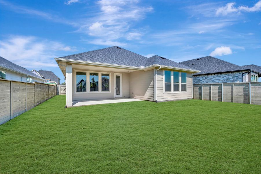 Exterior details and patio area of a home in Treeline, Justin (Image 17).