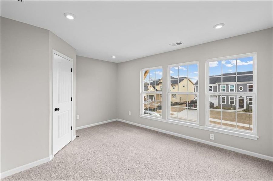 Spacious, unfurnished interior of a new home in The Reserve At Liberty Park, Braselton (Image 38).