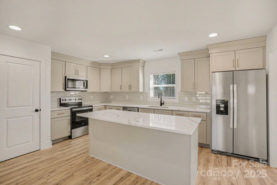 Furnished interior view inside a new home in , Statesville (Image 8).