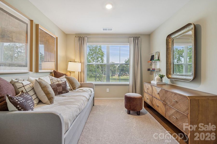 Example rendering Only - Home under construction with estimated completion in April or May.