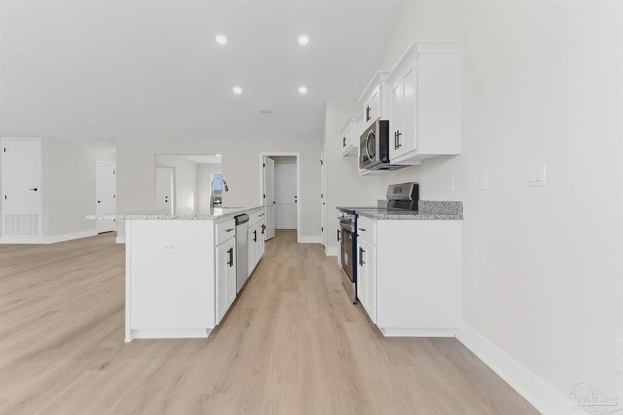 Furnished interior view inside a new home in Pecan Valley, Cantonment (Image 4). Furnished interior view inside a new home in Pecan Valley, Cantonment (Image 4).