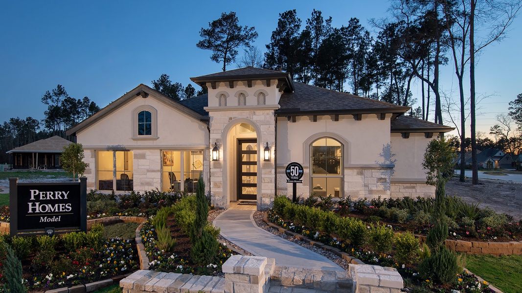Representative exterior photo of a completed home built from the 2935M by Perry Homes in Lakes of Cane Island, Katy, TX (Image 19).
