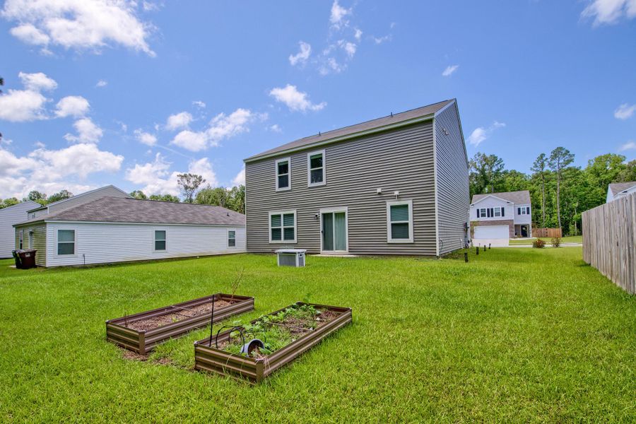 Front exterior of a new home in Stone Ridge, Moncks Corner, SC, highlighting curb appeal (Image 27).