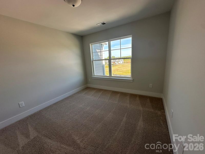 Spacious, unfurnished interior of a new home in Blythe Mill Townhomes, Waxhaw (Image 10).