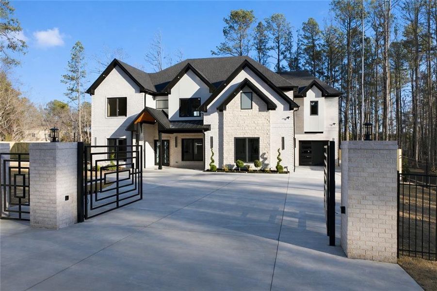 Front exterior of a new home in , Lawrenceville, GA, highlighting curb appeal (Image 32).