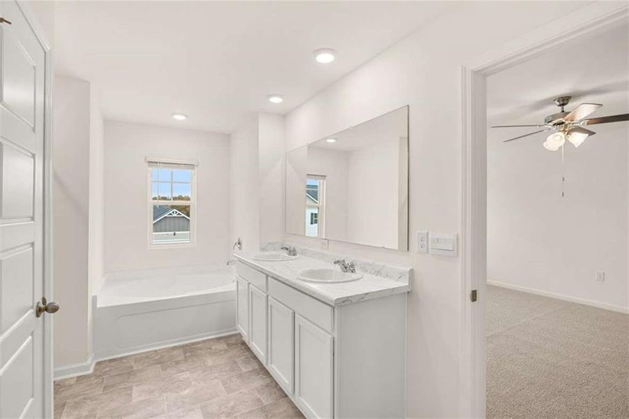 Furnished interior view inside a new home in Champion's Run, Lithonia (Image 9).