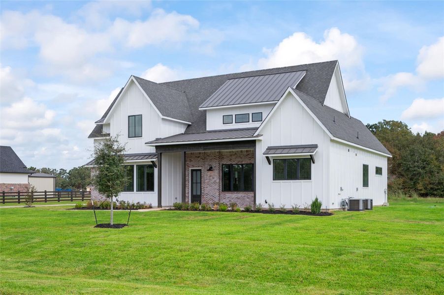 Front exterior of a new home in , Montgomery, TX, highlighting curb appeal (Image 1).
