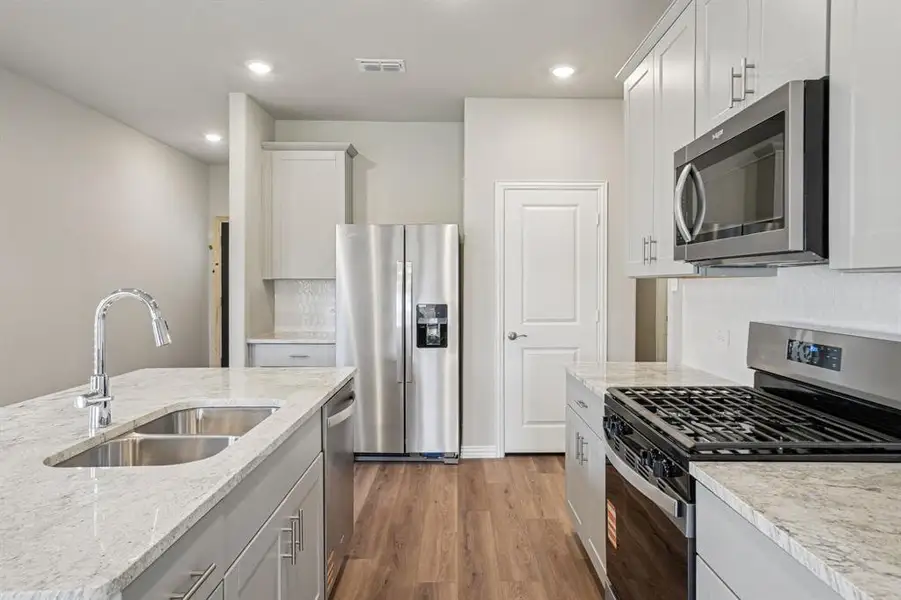 Photo is not of the actual home, but is an inspirational photo of builder’s model home and may depict options, furnishings, and/or decorator features that are not included.