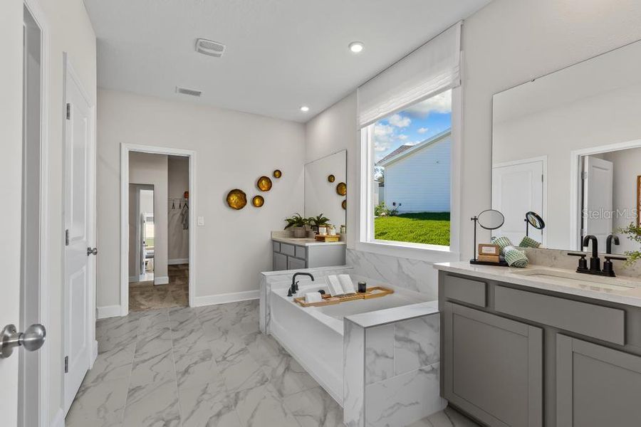 Furnished interior view inside a new home in The Cypress Series at Reserve East, Flagler Beach (Image 22).