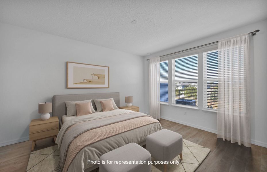 Furnished interior view inside a new home in Del Webb Wildlight, Yulee (Image 9).