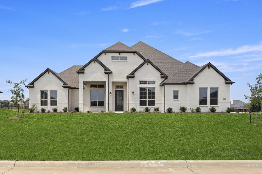 Representative exterior photo of a completed home built from the Wildwood SE by Sandlin Homes in Settler's Glen, New Fairview, TX (Image 23).