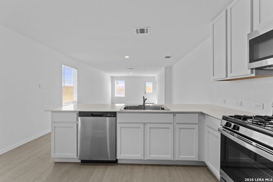 Furnished interior view inside a new home in Espada, San Antonio (Image 6).